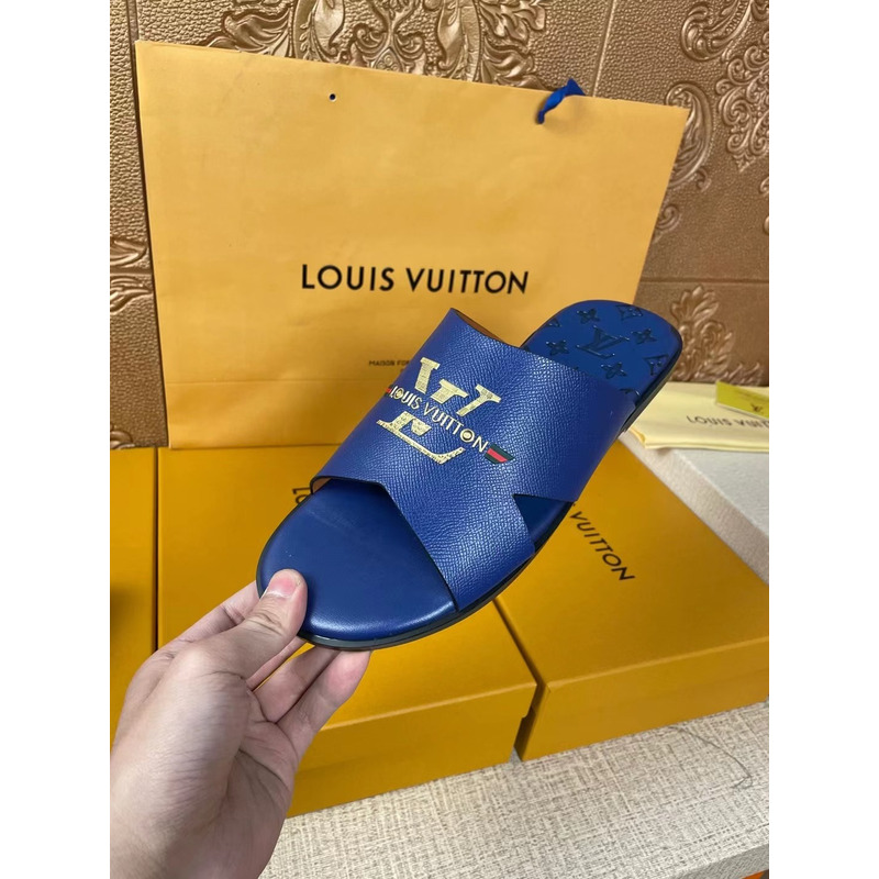 l**is V*t*n gold logo mules blue