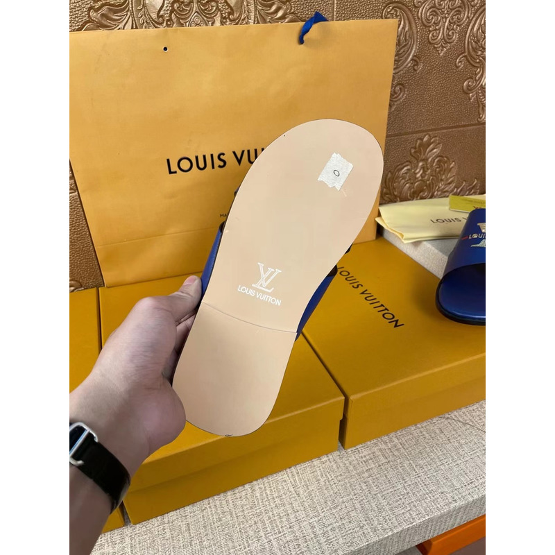 l**is V*t*n gold logo mules blue