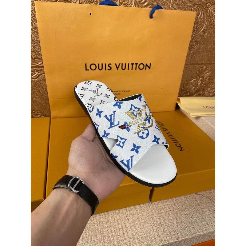 l**is V*t*n gold logo blue monogram mules black