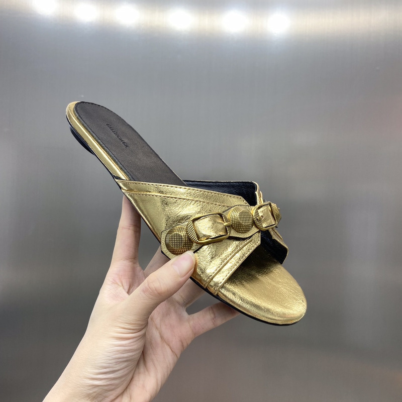 Ba*len*cia*ga cagole flats sandals in arena metallic lambskin gold