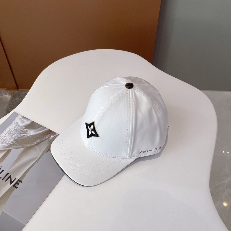 l**is V*t*n embroidered logo hat white