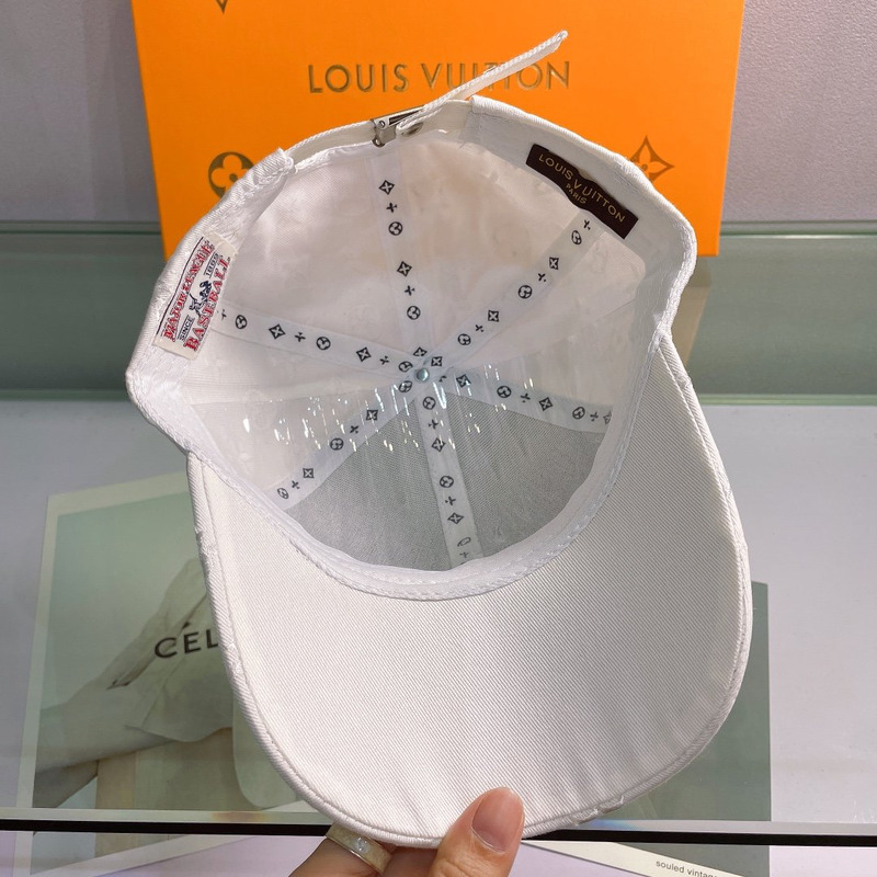 l**is V*t*n emroidered monogram hat white