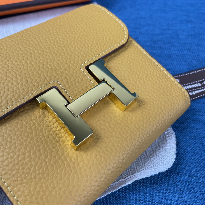 H**mes constance slim wallet yellow