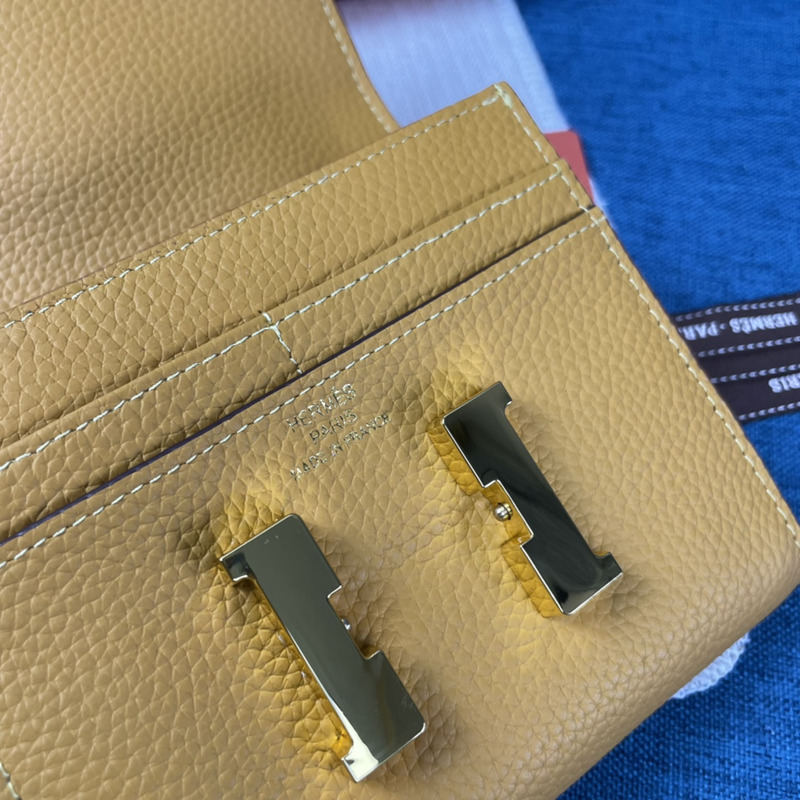 H**mes constance slim wallet yellow