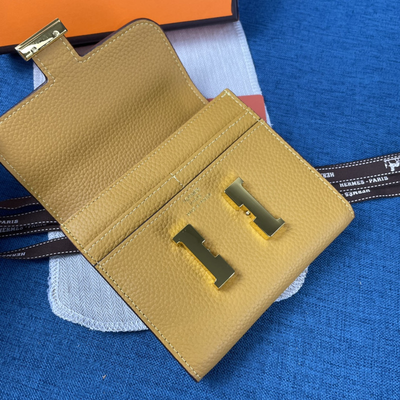 H**mes constance slim wallet yellow