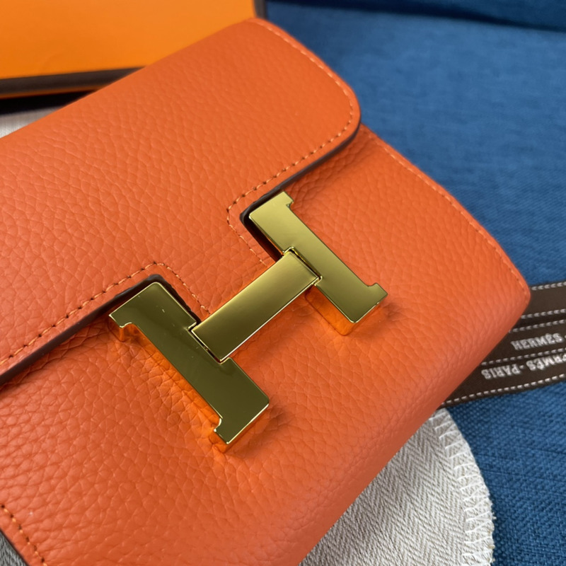 H**mes constance slim wallet orange