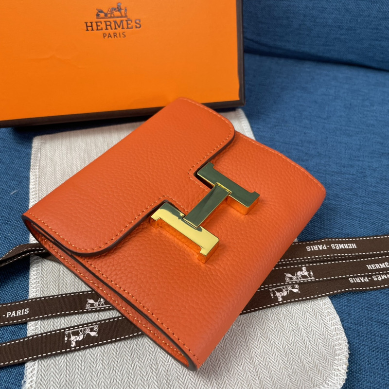 H**mes constance slim wallet orange