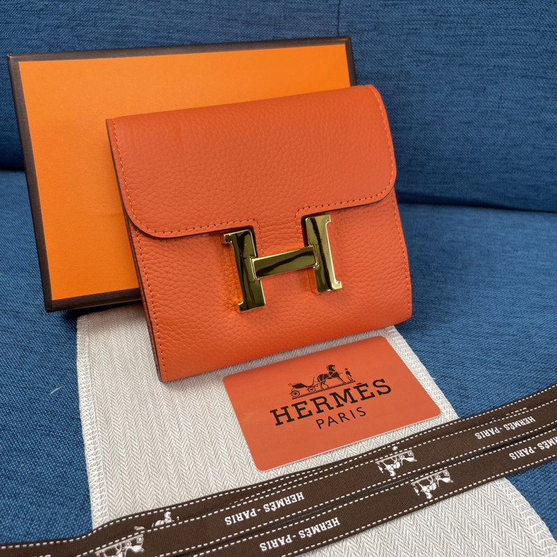 H**mes constance slim wallet orange