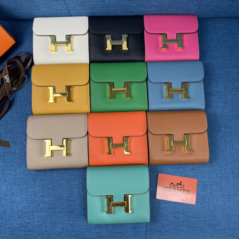 H**mes constance slim wallet orange