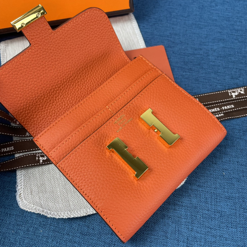 H**mes constance slim wallet orange