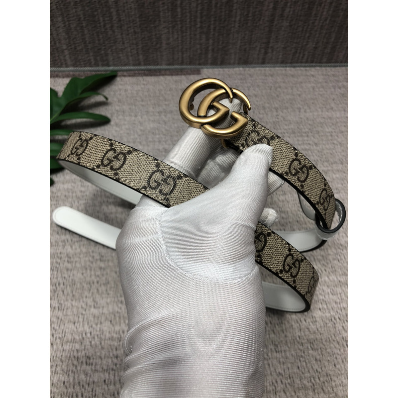 G*u*i double g gold-tone belt white gray