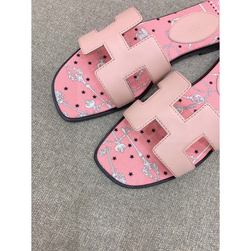 H**mes oran flat sandals in pink