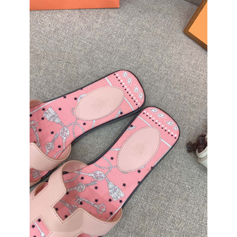 H**mes oran flat sandals in pink