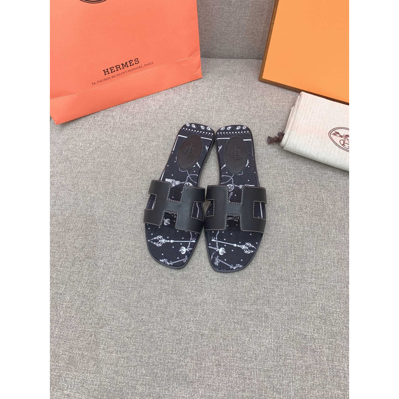 H**mes oran flat sandals in black