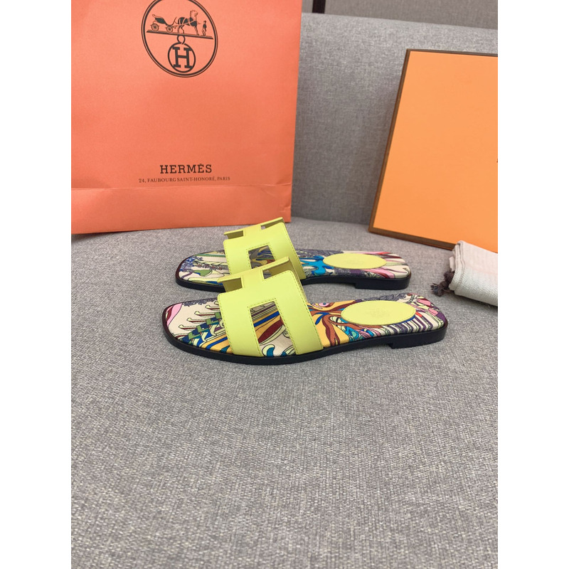 H**mes oran flat sandals in yellow