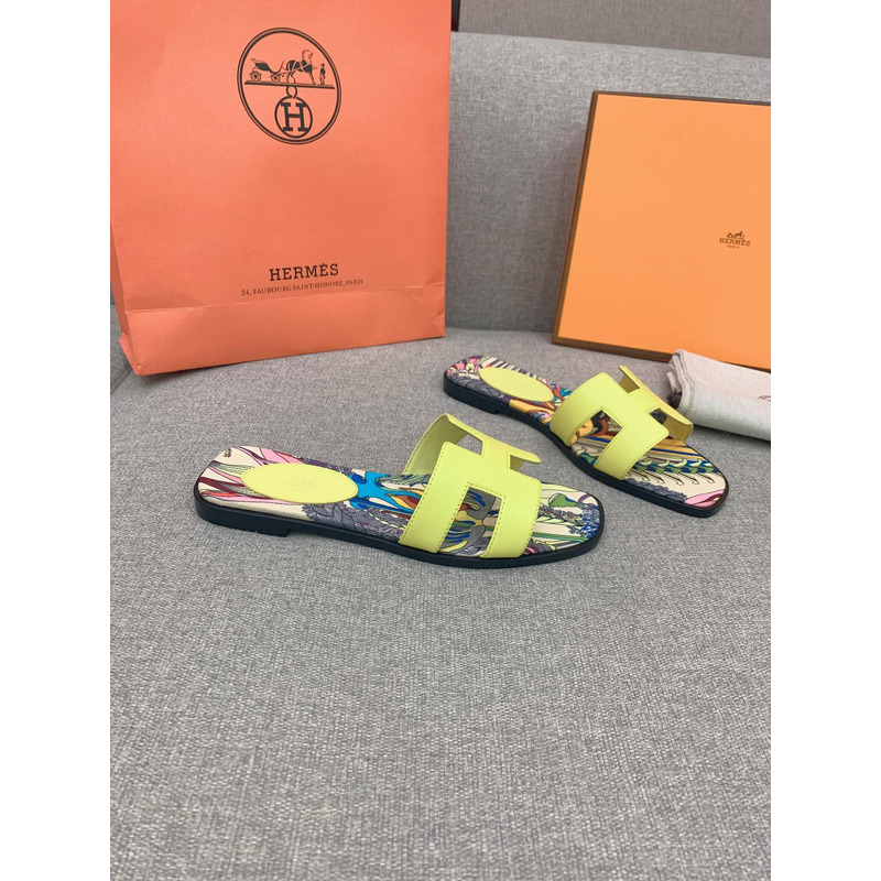 H**mes oran flat sandals in yellow