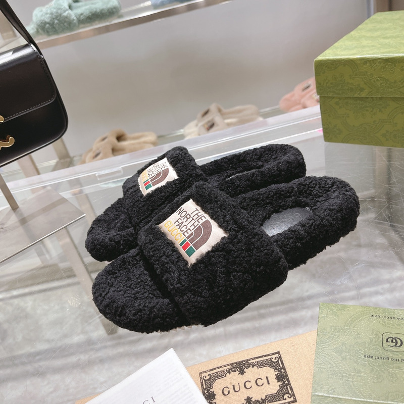 G*u*i x the north face shearling slides black