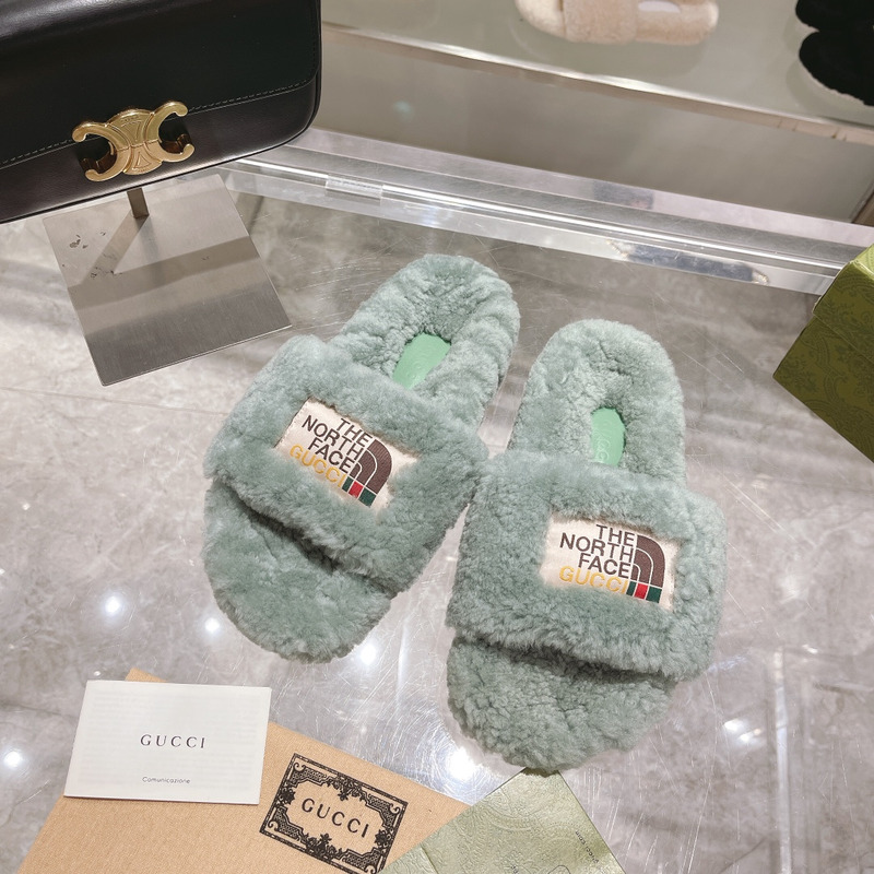 G*u*i x the north face shearling slides green