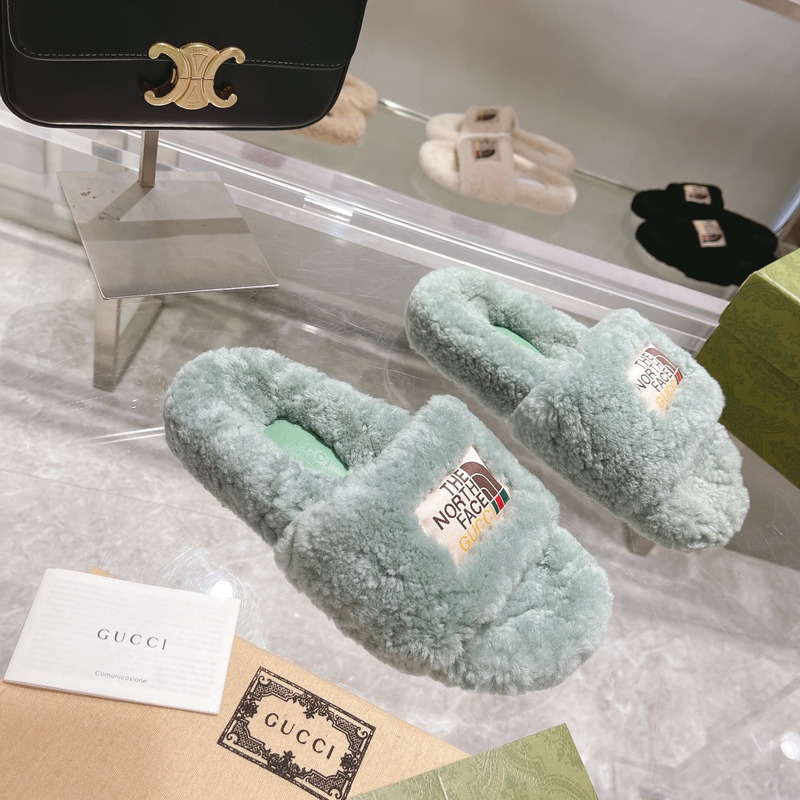 G*u*i x the north face shearling slides green