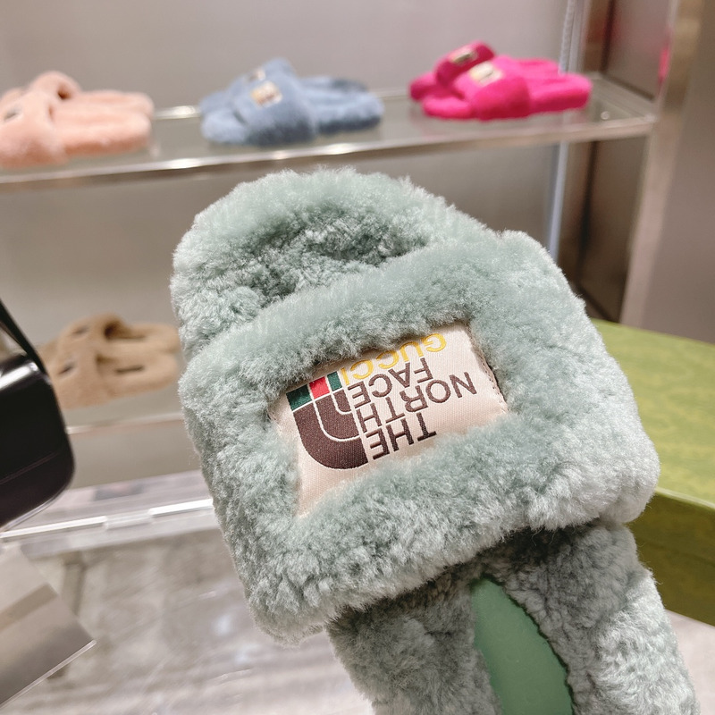 G*u*i x the north face shearling slides green