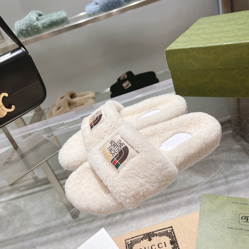 G*u*i x the north face shearling slides white