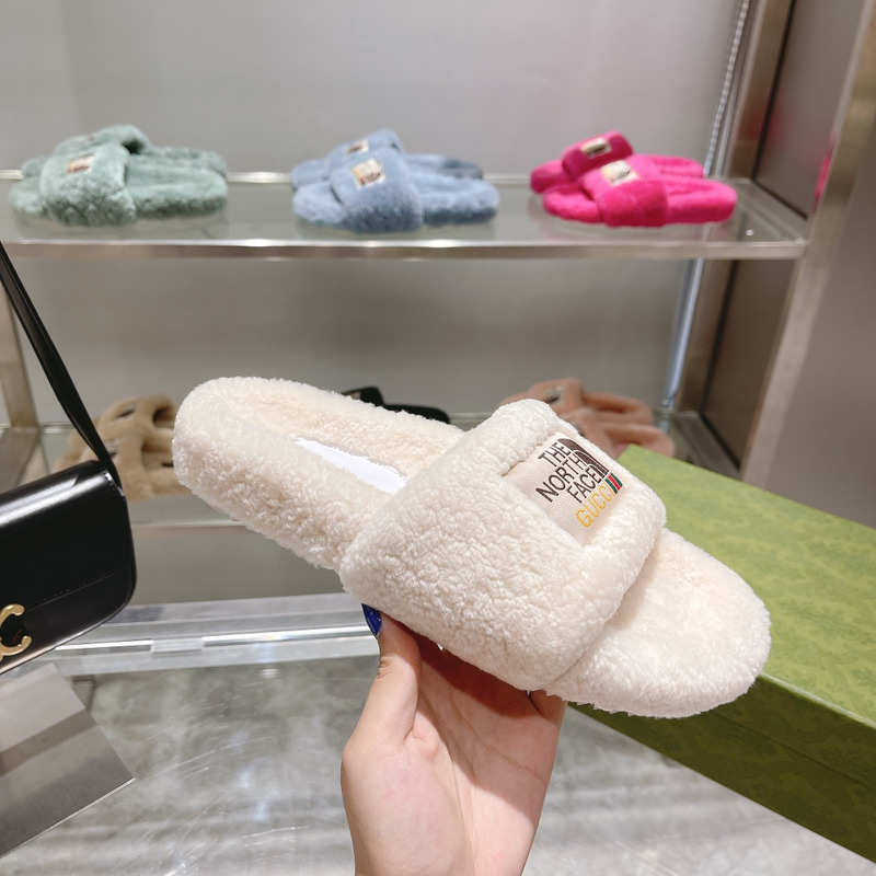 G*u*i x the north face shearling slides white