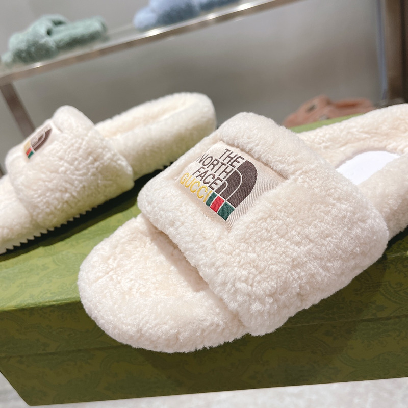 G*u*i x the north face shearling slides white