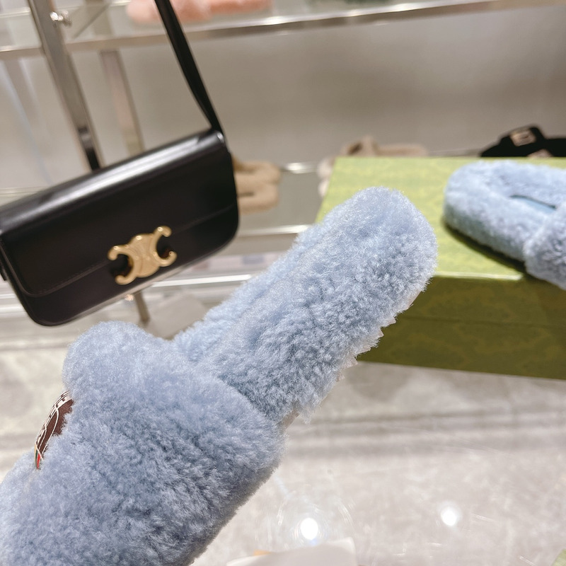 G*u*i x the north face shearling slides blue