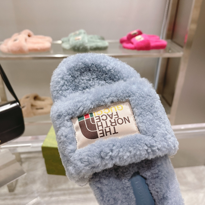 G*u*i x the north face shearling slides blue