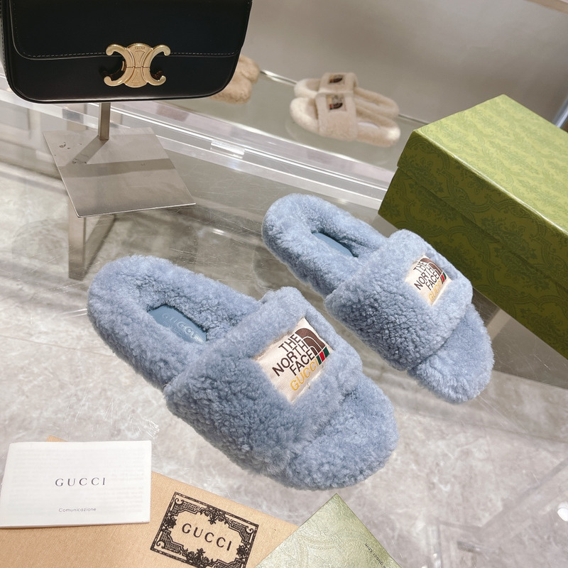 G*u*i x the north face shearling slides blue