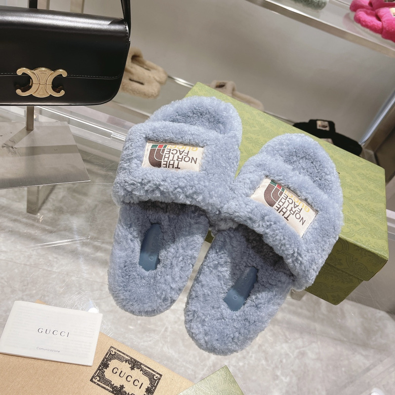 G*u*i x the north face shearling slides blue