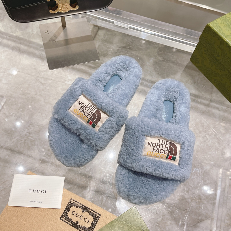 G*u*i x the north face shearling slides blue