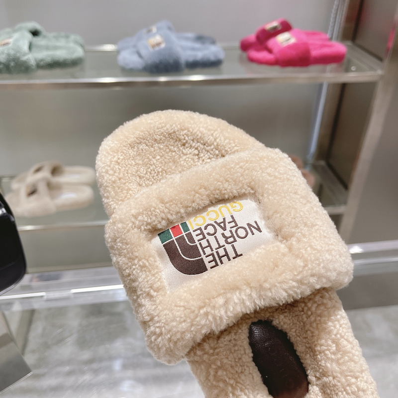 G*u*i x the north face shearling slides beige