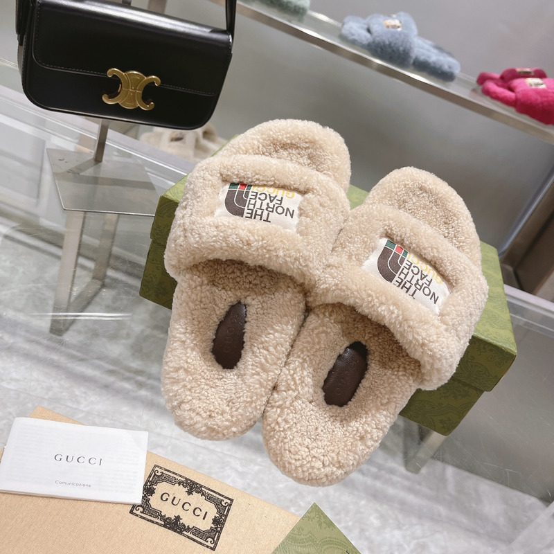 G*u*i x the north face shearling slides beige