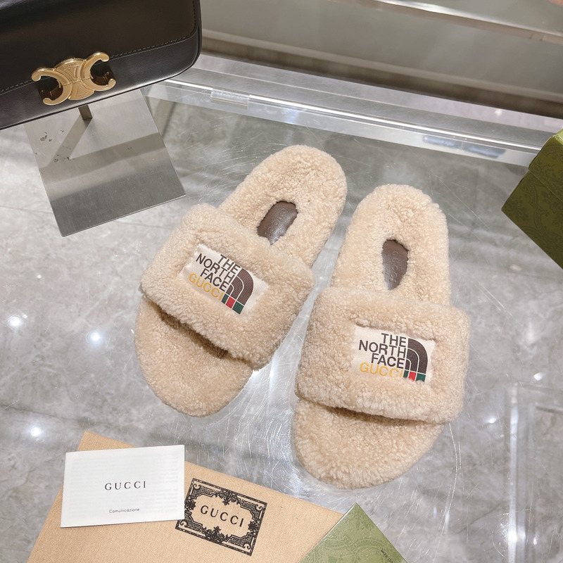 G*u*i x the north face shearling slides beige