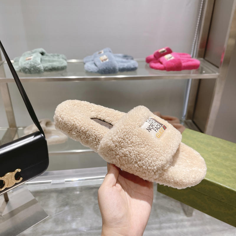 G*u*i x the north face shearling slides beige