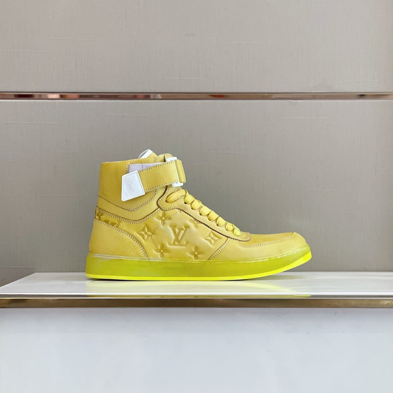 l**is V*t*n embossed monogram high-top sneaker gold