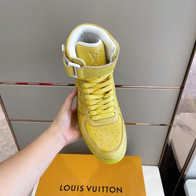 l**is V*t*n embossed monogram high-top sneaker gold