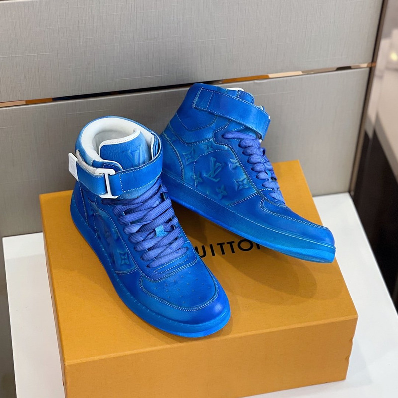 l**is V*t*n embossed monogram high-top sneaker blue