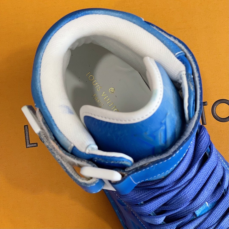 l**is V*t*n embossed monogram high-top sneaker blue