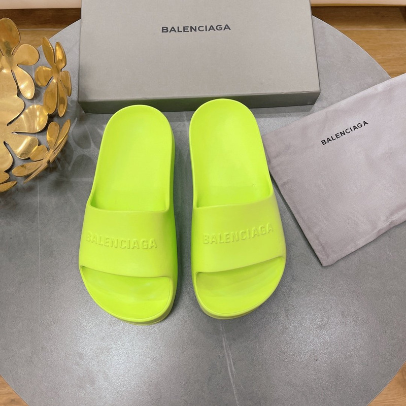 Ba*len*cia*ga logo rubber platform sandals yellow