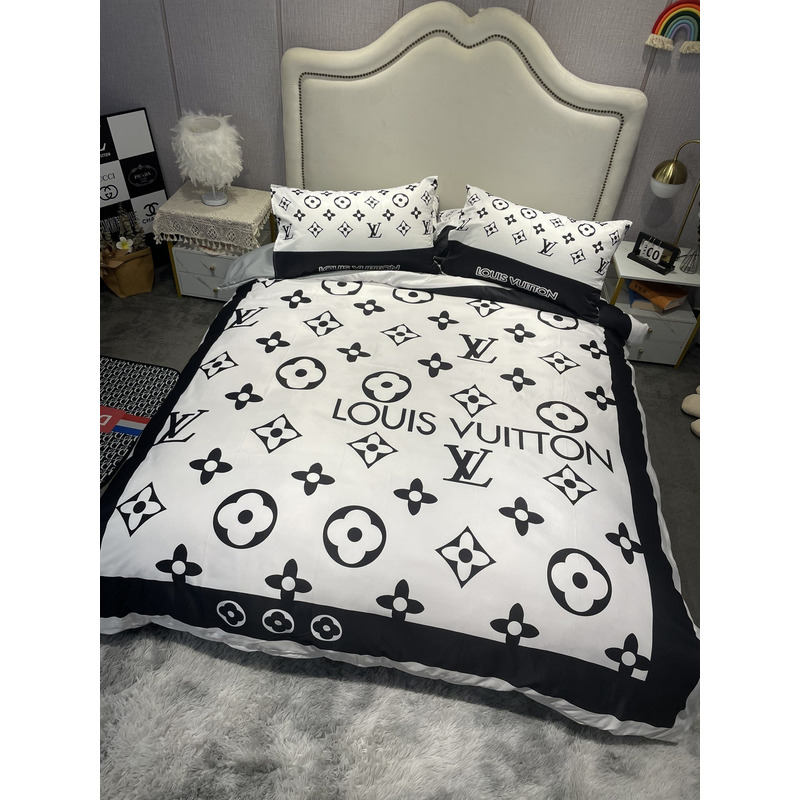 l**is V*t*n four piece bed suit bedding monogram white