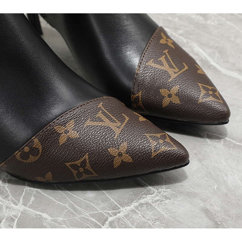 l**is V*t*n logo print ankle boots