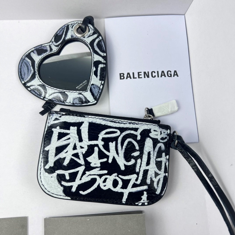 Ba*len*cia*ga le cagole shoulder bag in black and white graffiti printed arena lambskin