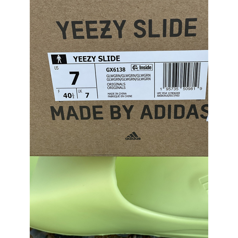 Ad*s yeezy slides glow green