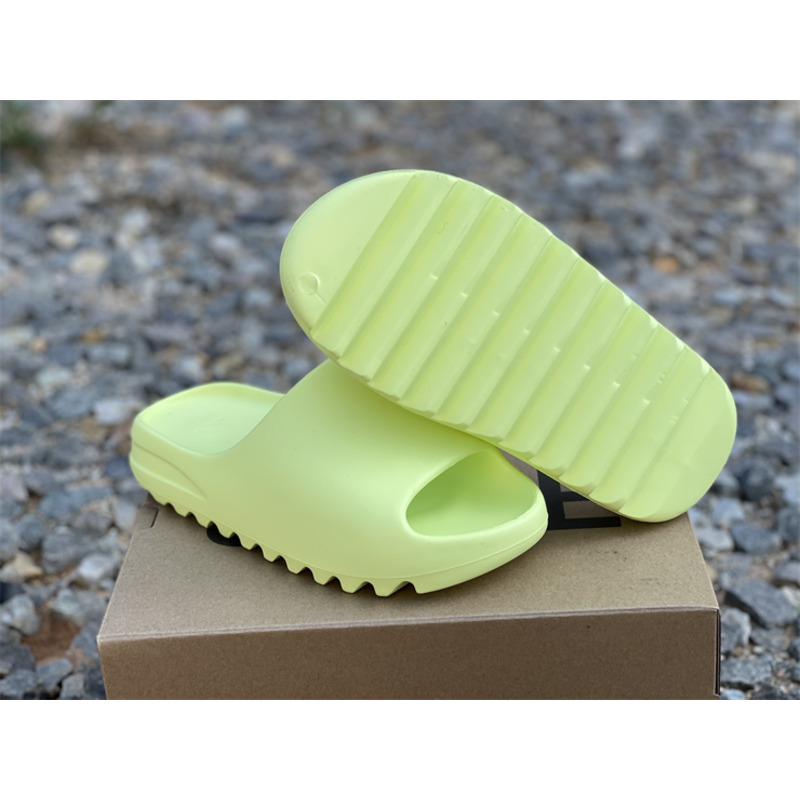 Ad*s yeezy slides glow green