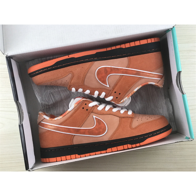 Nike Concepts x Nike SB Dunk Low in Orange Lobster White