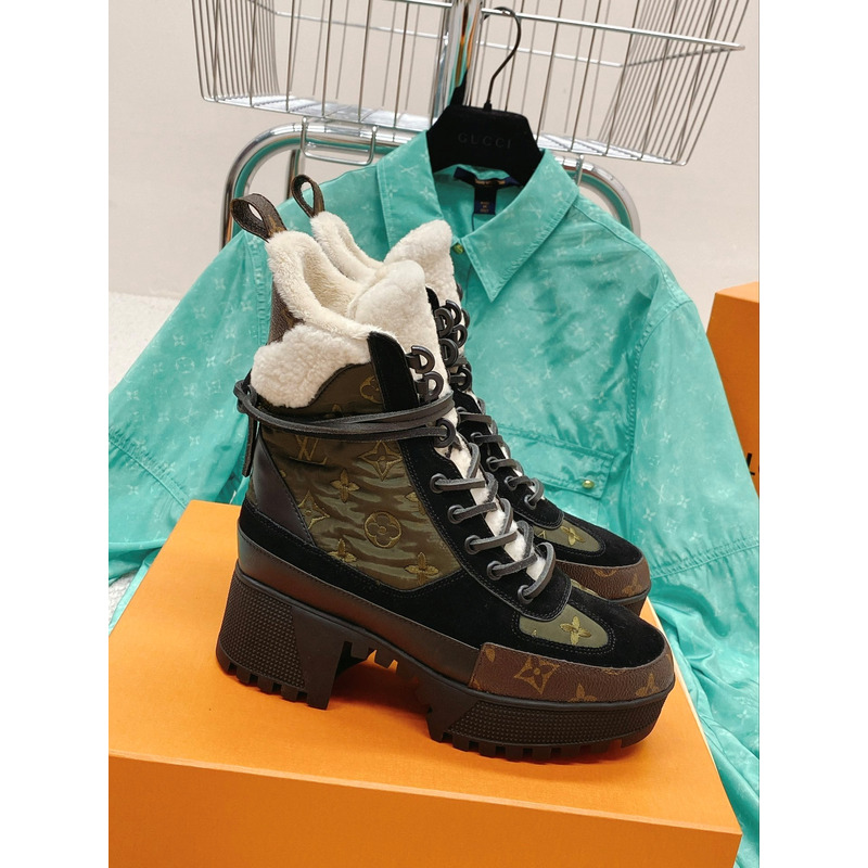 l**is V*t*n laureate monogram platform boots green