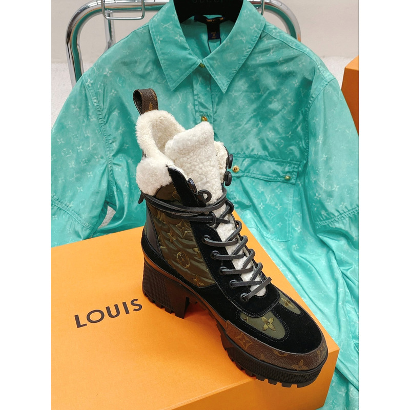 l**is V*t*n laureate monogram platform boots green