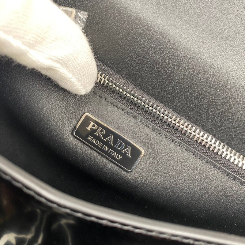 Pra*a shiny leather shoulder bag black